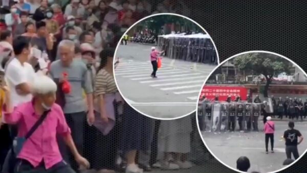 高齢女性が単身で警察に対峙　中国信宜での抗議が波紋