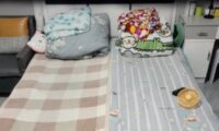 シェアルームならぬ「シェアベッド」　同じベッドで眠る中国の若者た